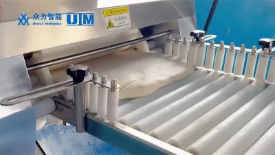 Machine à façonner les petits pains chinois cuits à la vapeur