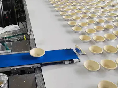 Machine à fabriquer les bases de tartes